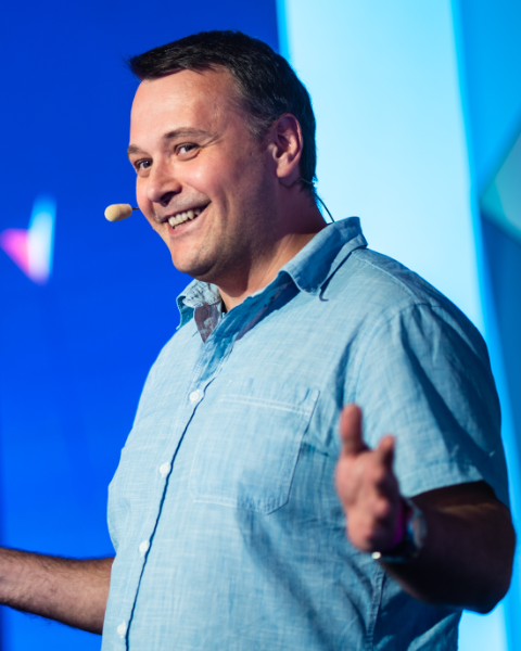 Igor Konnov speaking at a conference in 2023